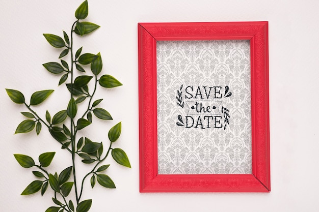 Download Free PSD | Save the date mock-up red frame and plant