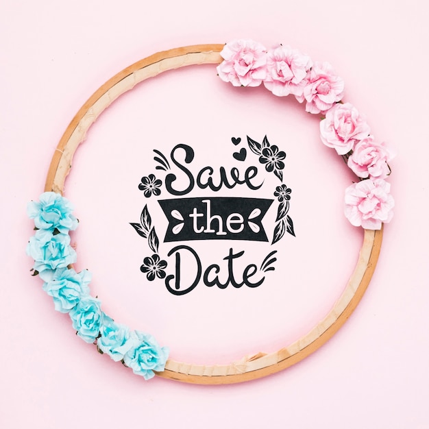 Save the date mock-up with blue and pink roses Free Psd