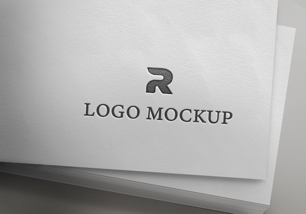 Download Premium PSD | Silver logo mockup on paper