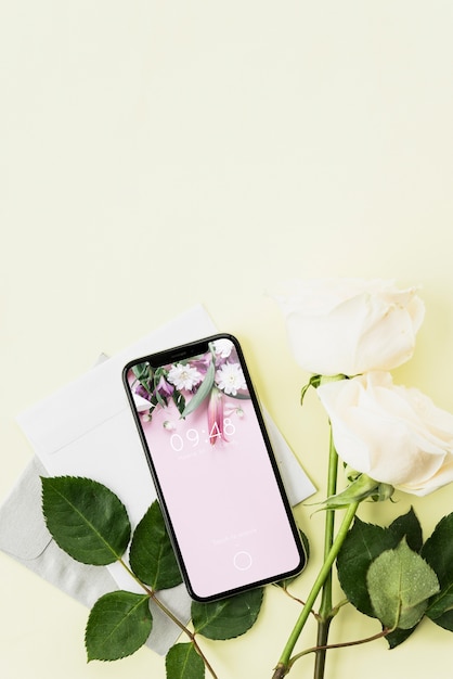 Download Smartphone mockup and flowers | Free PSD File