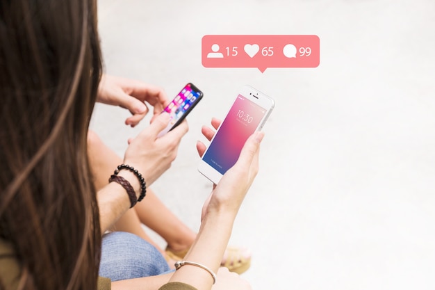 Smartphone mockup with social network concept PSD Template