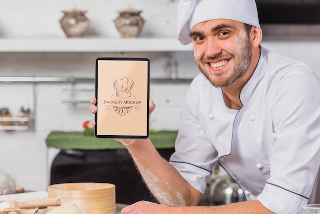 Free PSD | Smiley chef in the kitchen mock-up