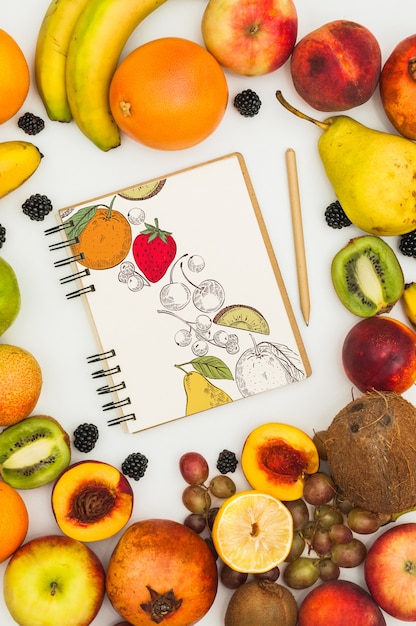 Download Spiral notebook mockup with fruits PSD file | Free Download PSD Mockup Templates