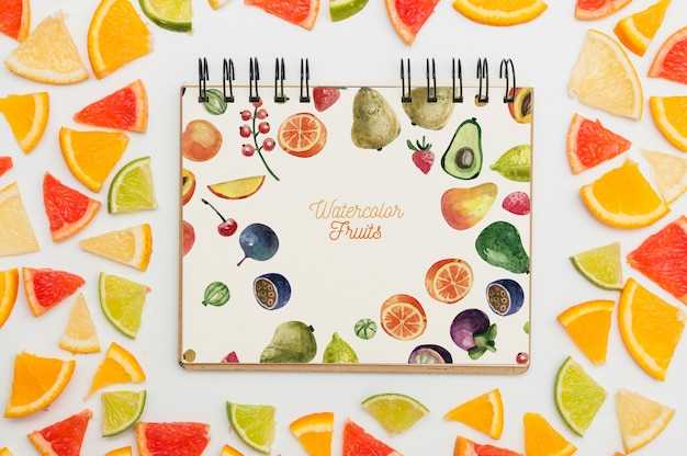 Download Spiral notebook mockup with fruits PSD file | Free Download