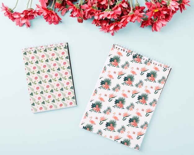 Download Free Psd Spiral Notepad Mockup With Flowers On Top