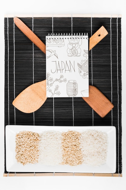 Download Spiral notepad mockup with japanese food mockup | Free PSD File