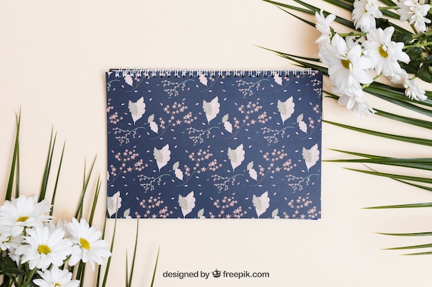 Spring mockup with spiral notebook PSD Template