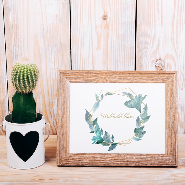 Free Psd Spring Mockup With Wooden Frame And Cactus