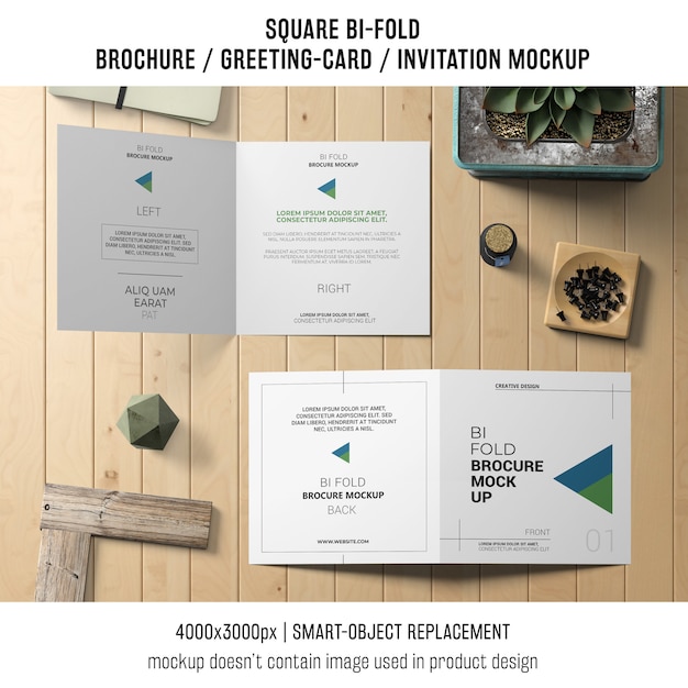 Download Square bi-fold brochure or greeting card mockup on wooden ...