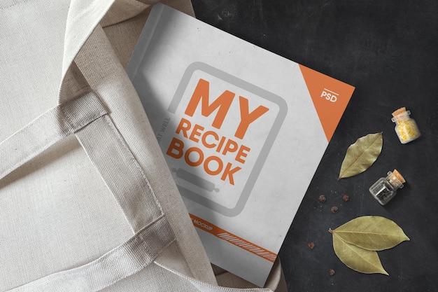 Download Square book in a tote bag mockup | Premium PSD File