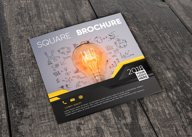 Download Square brochure mockup on wooden surface | Free PSD File