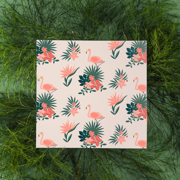 Square card mockup with tropical leaves PSD Template