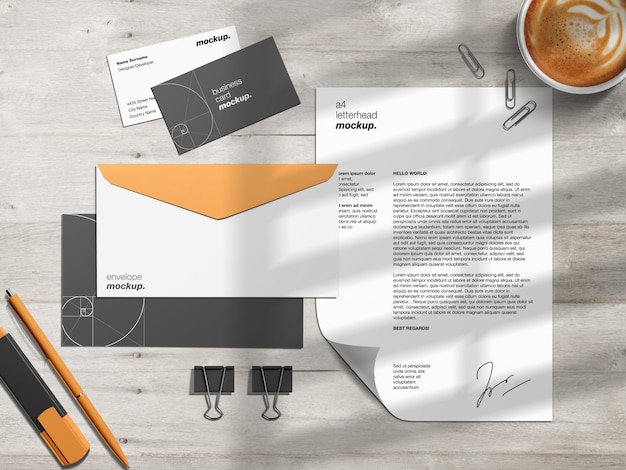 Download Free Stationery Branding Identity Mockup Template And Scene Creator With Letterhead Business Cards And Envelopes On Work Desk Premium Psd File PSD Mockups.