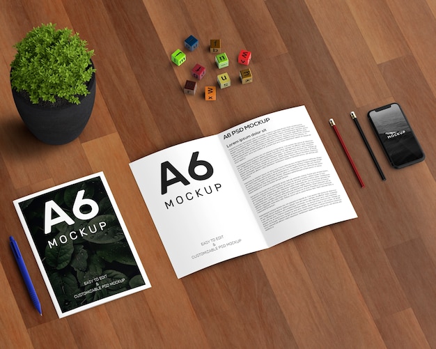 Download Stationery concept with a6 brochure mockup | Free PSD File