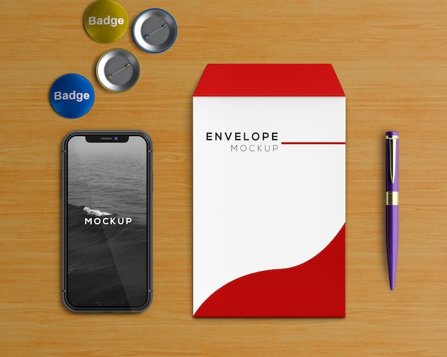 Download Stationery concept with envelope and smartphone mockup | Free PSD File