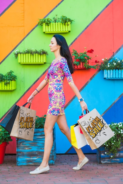 Download Stylish woman with shopping bags mockup PSD file | Free ...