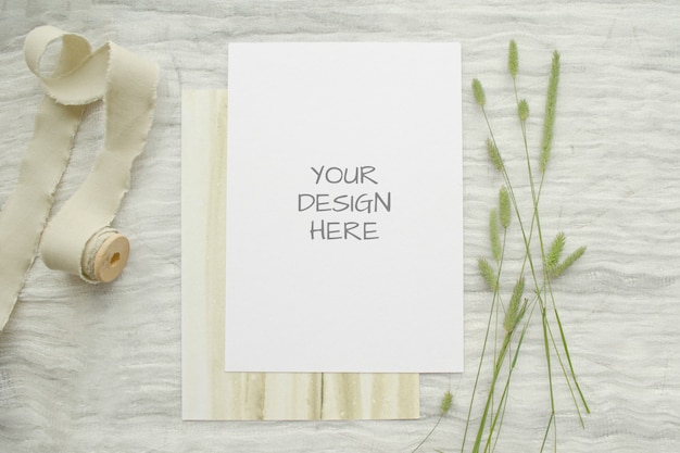 Download Premium Psd Summer Stationery Mockup Ard For Greeting Card Or Wedding Invitation With Herbs Vintage Spool Of Cotton Braid On White PSD Mockup Templates