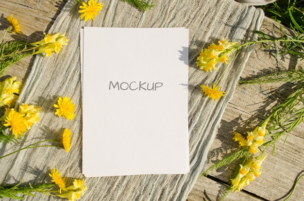 Download Premium Psd Summer Stationery Mockup Greeting Card Or Wedding Invitation With Yellow Flowers On A Old Wood Space In Rustic Style And Natural PSD Mockup Templates