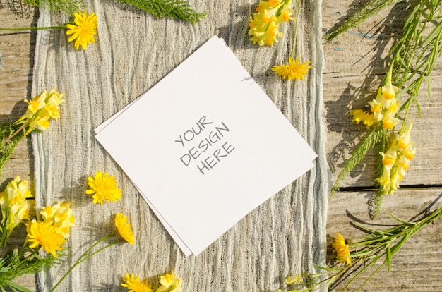 Download Premium Psd Summer Stationery Mockup Greeting Card Or Wedding Invitation With Yellow Flowers On A Old Wood Space In Rustic Style And Natural PSD Mockup Templates