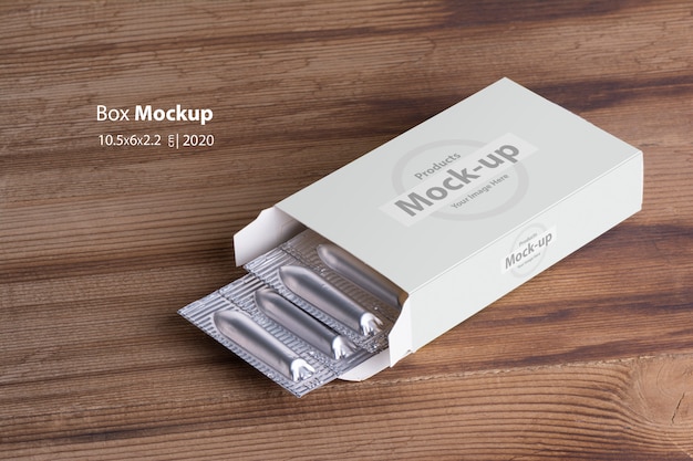 Download Suppositories loafs inside box mockup on wooden table ...