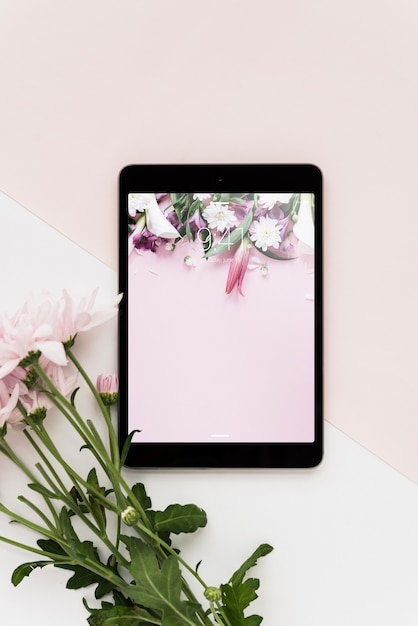 Download Tablet mockup with flowers | Free PSD File