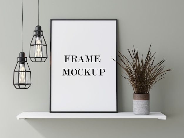 Thin black frame leaning against wall beside dry plant 3d rendering mockup Premium Psd