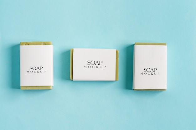 Download Three soap wrap box mock-up package with bar olive soap ...