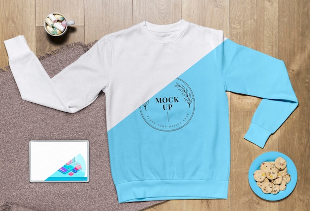 Download Top view blue hoodie mock-up with cookies and tablet ...