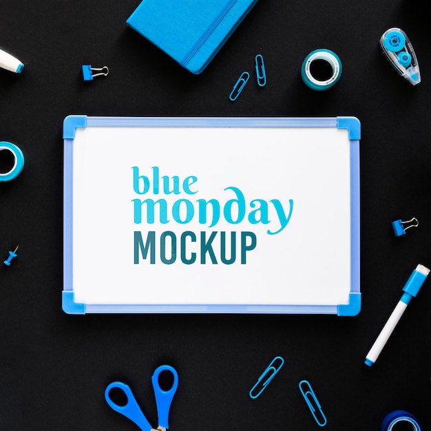 Download Free PSD | Top view of blue monday whiteboard with stationery