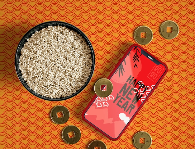 Top view bowl of rice golden coins and phone mock-up ...