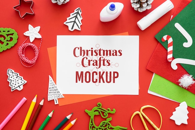 Download Free Psd Top View Of Christmas Crafts With Crayons And Paper Yellowimages Mockups