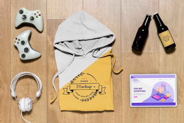 Download Top view folded hoodie mock-up with gadgets and bottles ...