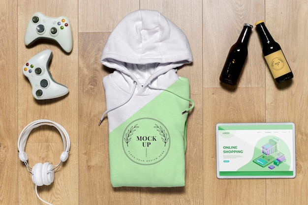 Download Top view green folded hoodie mock-up with gadgets and ...