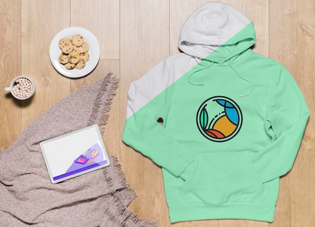 Download Top view hoodie mock-up with tablet and snack | Free PSD File