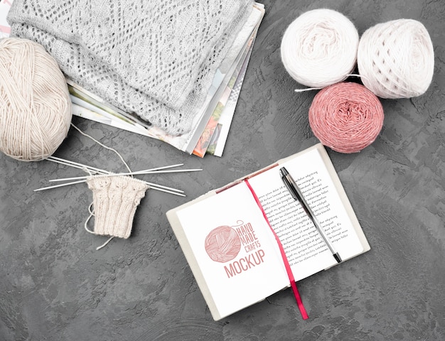 Download Premium PSD | Top view knitting products and mock-up agenda