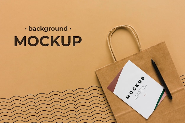 Download Premium PSD | Top view paper bag mock-up background