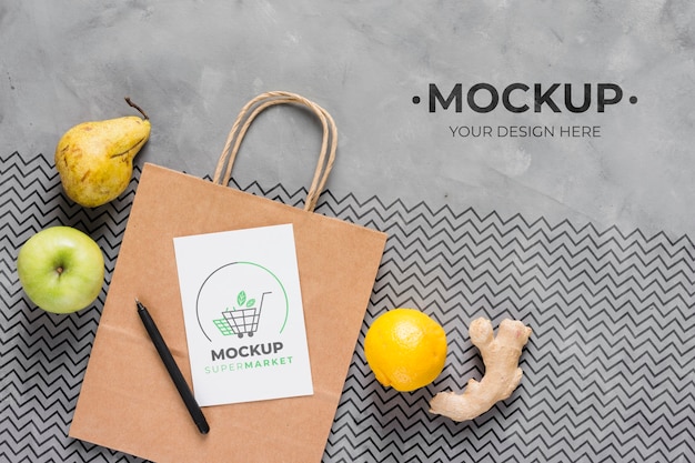 Download Premium PSD | Top view paper bag mock-up and fruit