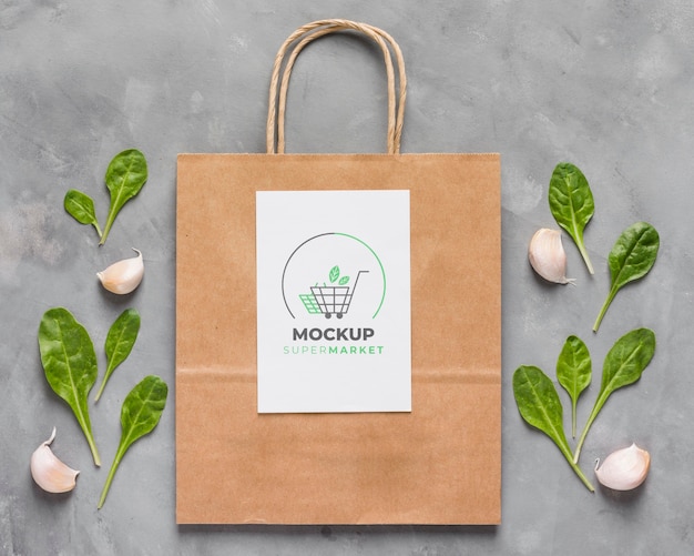 Download Free PSD | Top view paper bag mock-up and leaves