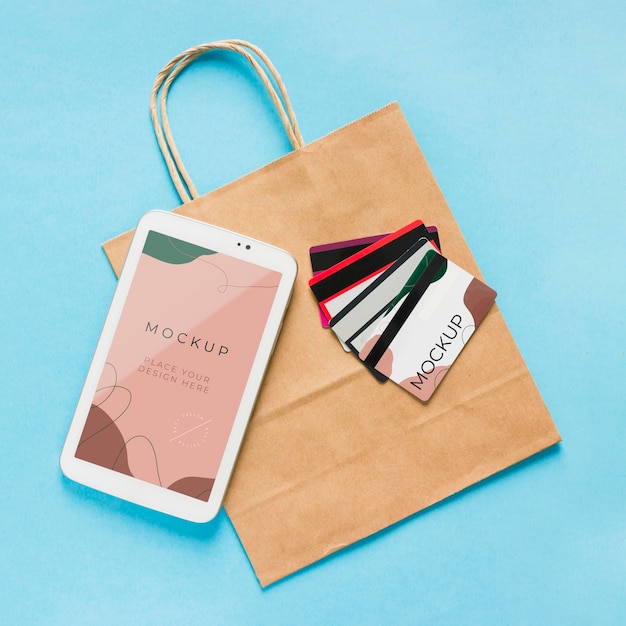 Download Free PSD | Top view paper bag mock-up with mobile phone ...