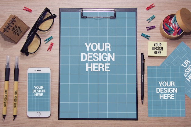 Download Top view of stationery mockup on desk | Premium PSD File