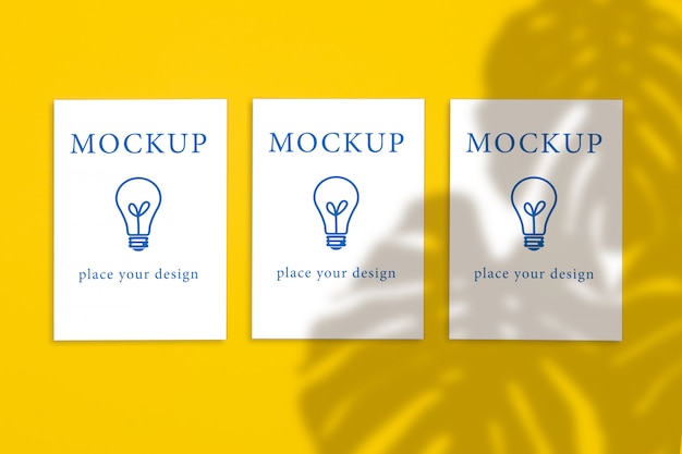 Premium Psd Top View Of Three Vertical Postcards On A Yellow Background Mockup