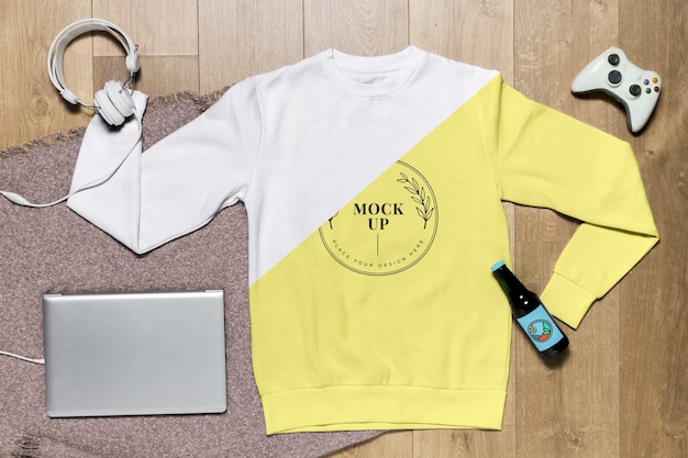 Download Top view yellow hoodie mock-up with gadget and bottle ...