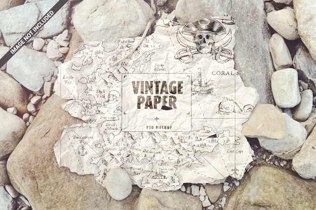 Download Torn old paper map on the stones mockup | Premium PSD File