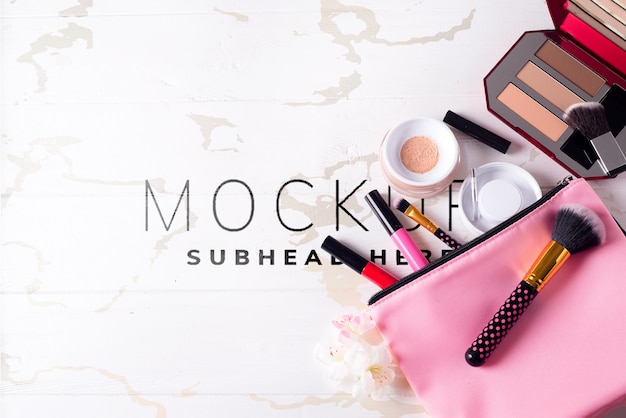 Various makeup products on marble table Premium Psd