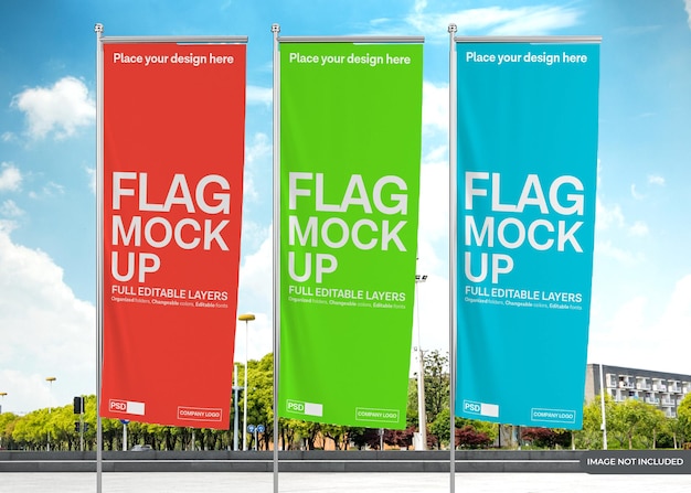 Premium PSD | Vertical flag mockup design against the sky