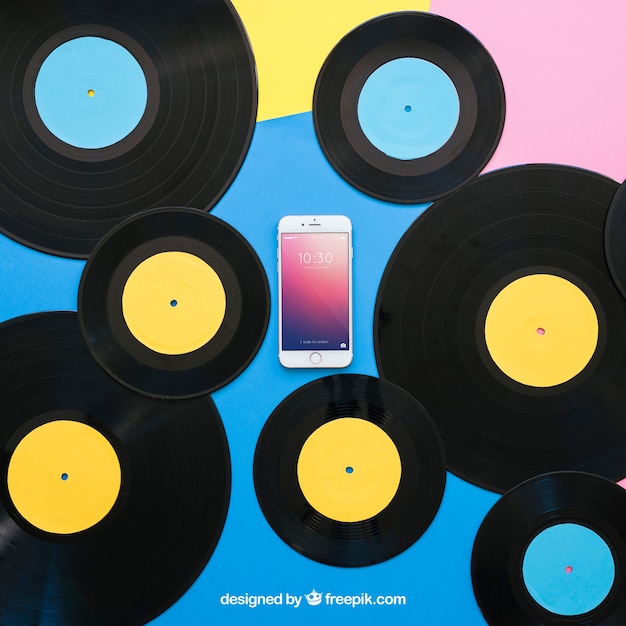 Download Free PSD | Vinyl mockup with smartphone