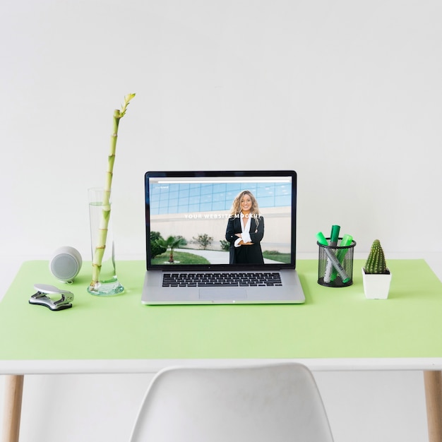 Download Website mockup with laptop on desk | Free PSD File