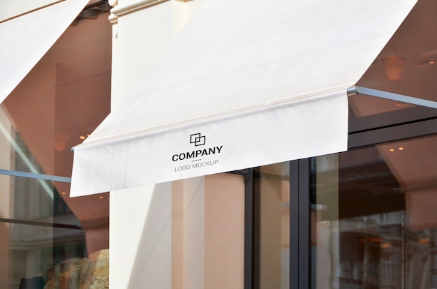 White awning front of city shop for text, logo mockup | Premium PSD File