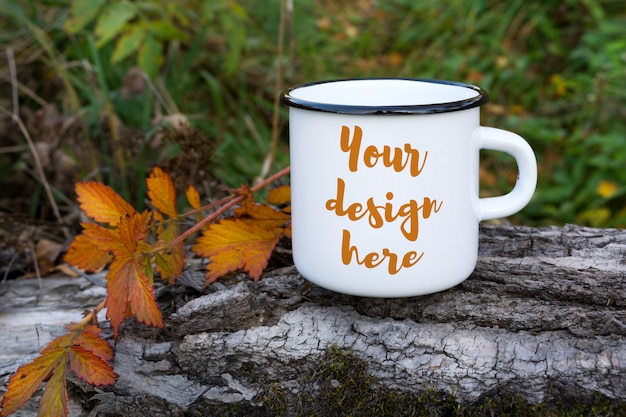 Download Premium PSD | White campfire mug mockup with orange leaf