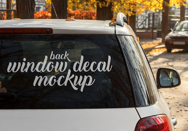 Download White car with a window decal mockup | Premium PSD File